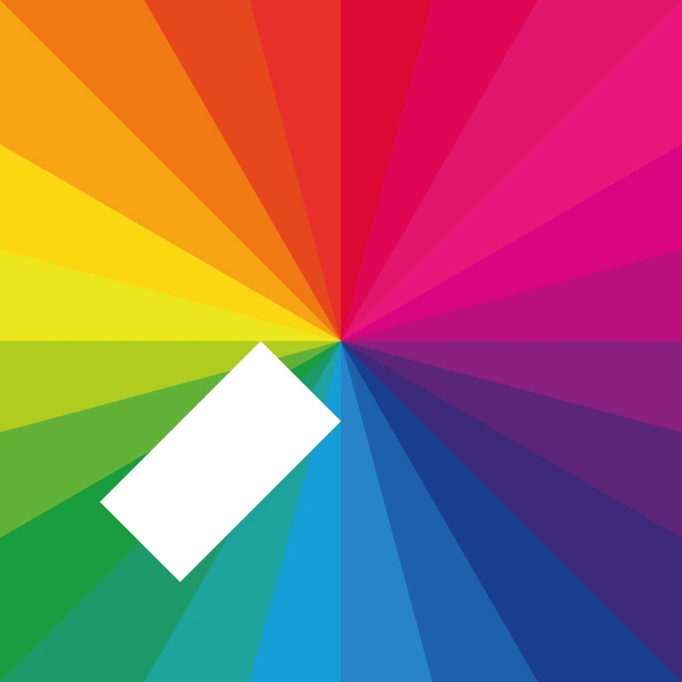 Jamie xx’s In Colour album cover: a spectrum of color radiating from the center with a white diagonal rectangle
